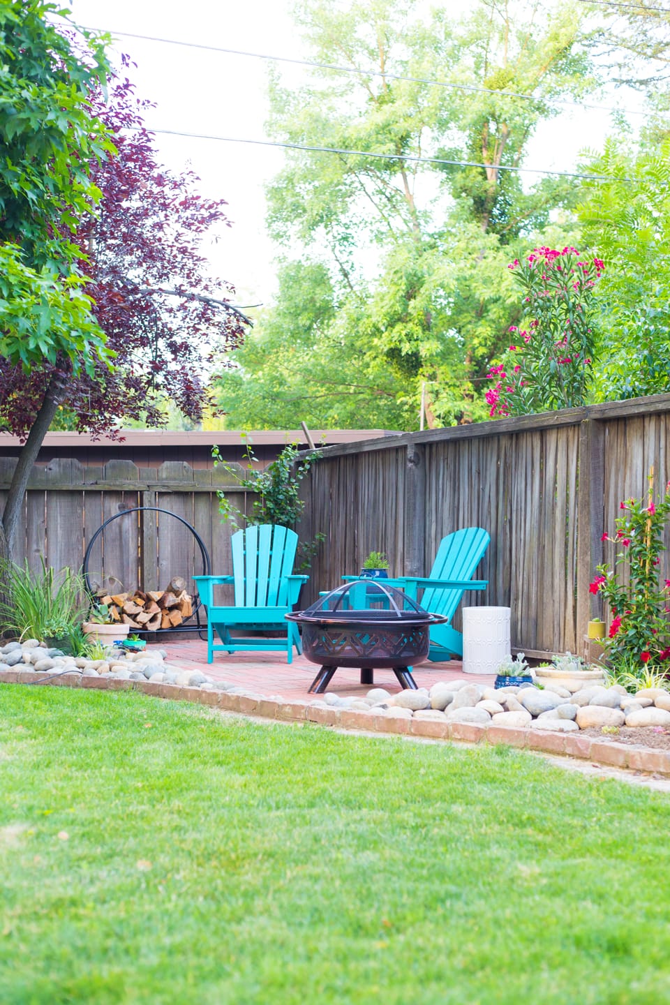 Corner Yard Landscaping Ideas with Adirondack Chairs