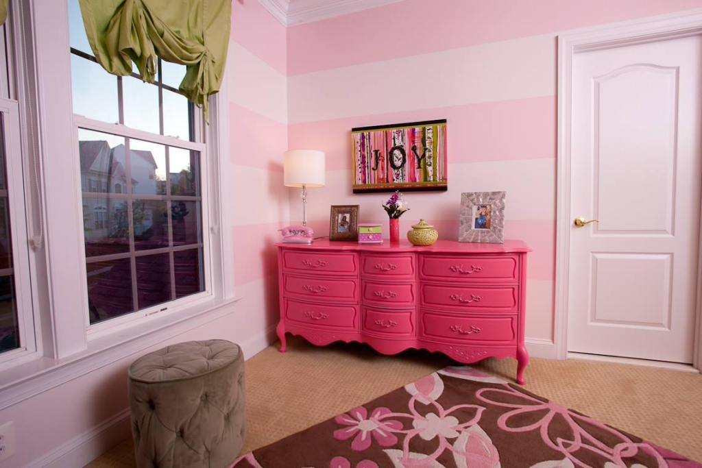 pink striped walls nursery