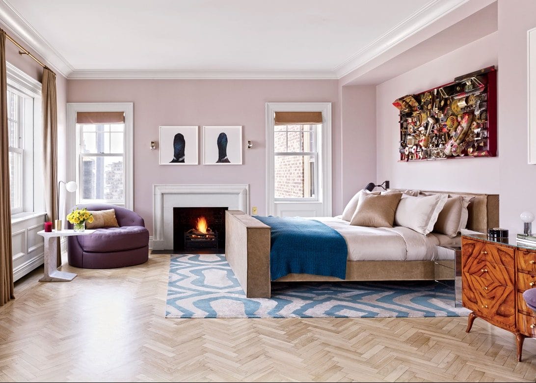 bedroom with fireplace and tv