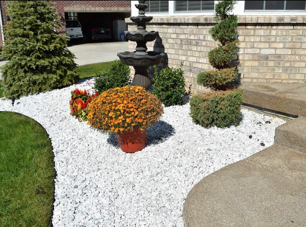 Image of White rock mulch in a flower bed